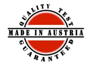runde österreich-flagge mit Qualitätszeichen